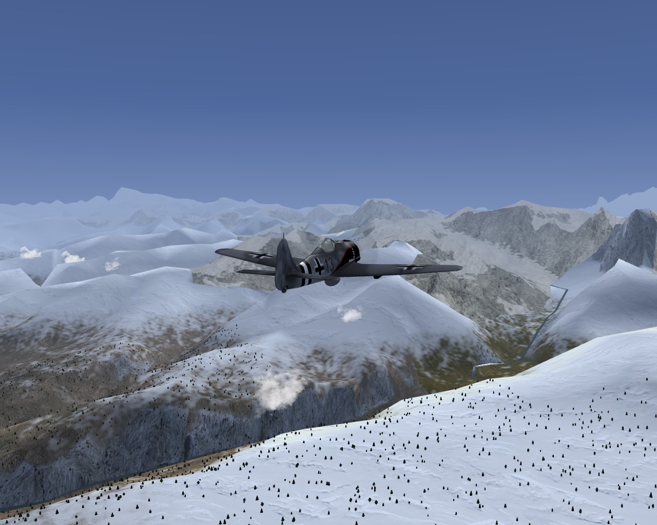 Approaching a bank of snow-covered mountains in the south of the Hindu Kush