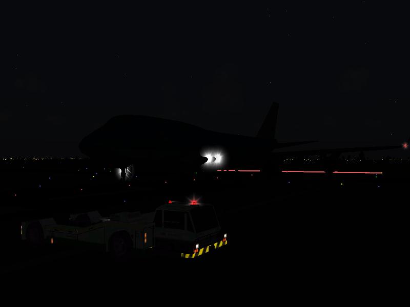 File:747-400 pushback night.jpg