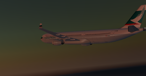 An Airbus A330 cruises in the dusk