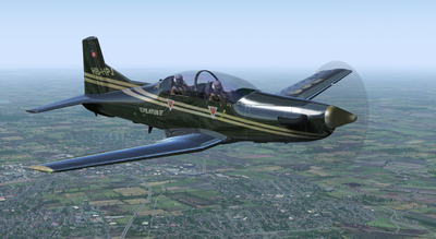 Pilatus PC-9M in reflective factory demonstrator livery