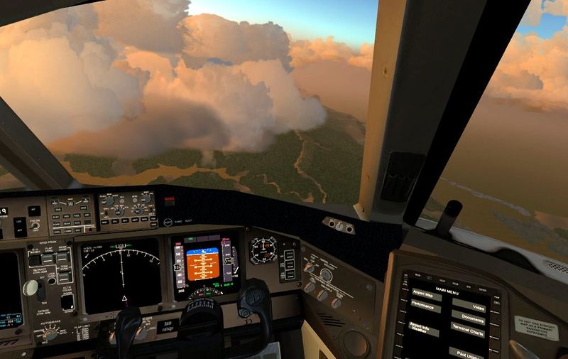 File:Boeing 777-200 Cockpit over clouds.jpg