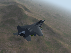 F-15E survolant le Nevada avec la configuration A/G
