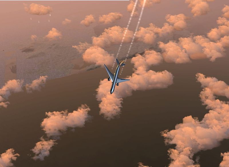 File:Boeing 777-200 over clouds 2.jpg