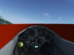 The cockpit of the single-seater glider Ka6, showing its pretty high canopy frame.