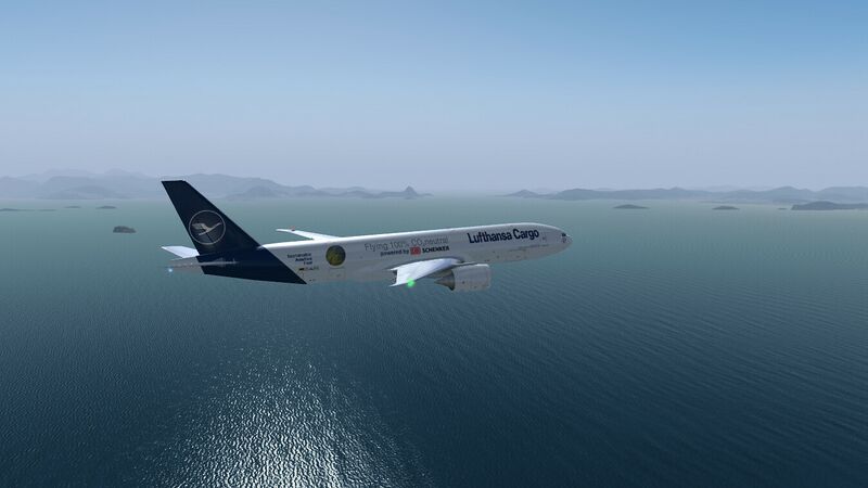 File:Lufthansa Cargo Boeing 777 over the sea of mountains.jpg