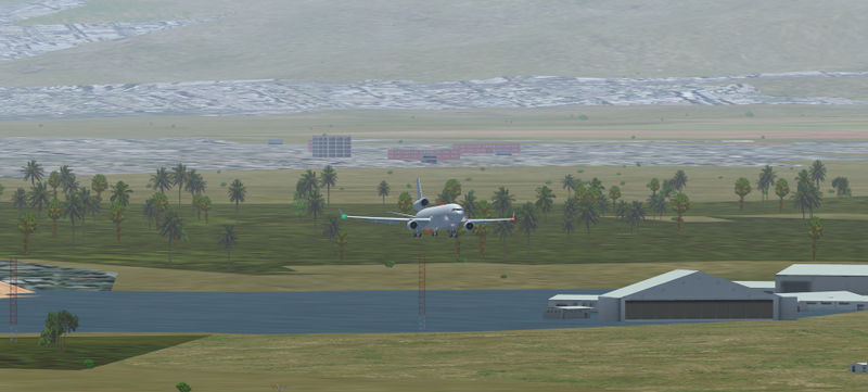 File:SOTM 2019-08 MD-11 at Honolulu with Floating House by Octal450.jpg